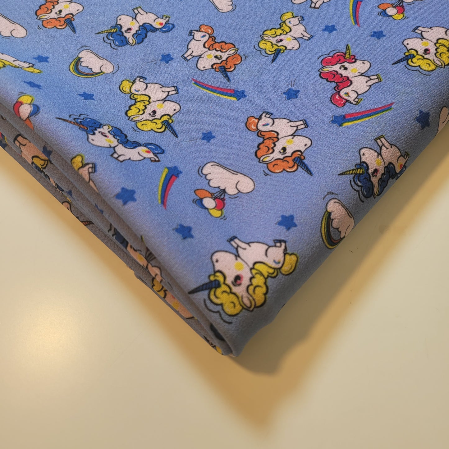 Scuba Crepe Fabric – Cute Cartoon Unicorn Print on Blue | Stretch Fabric by the Meter (58” Wide)