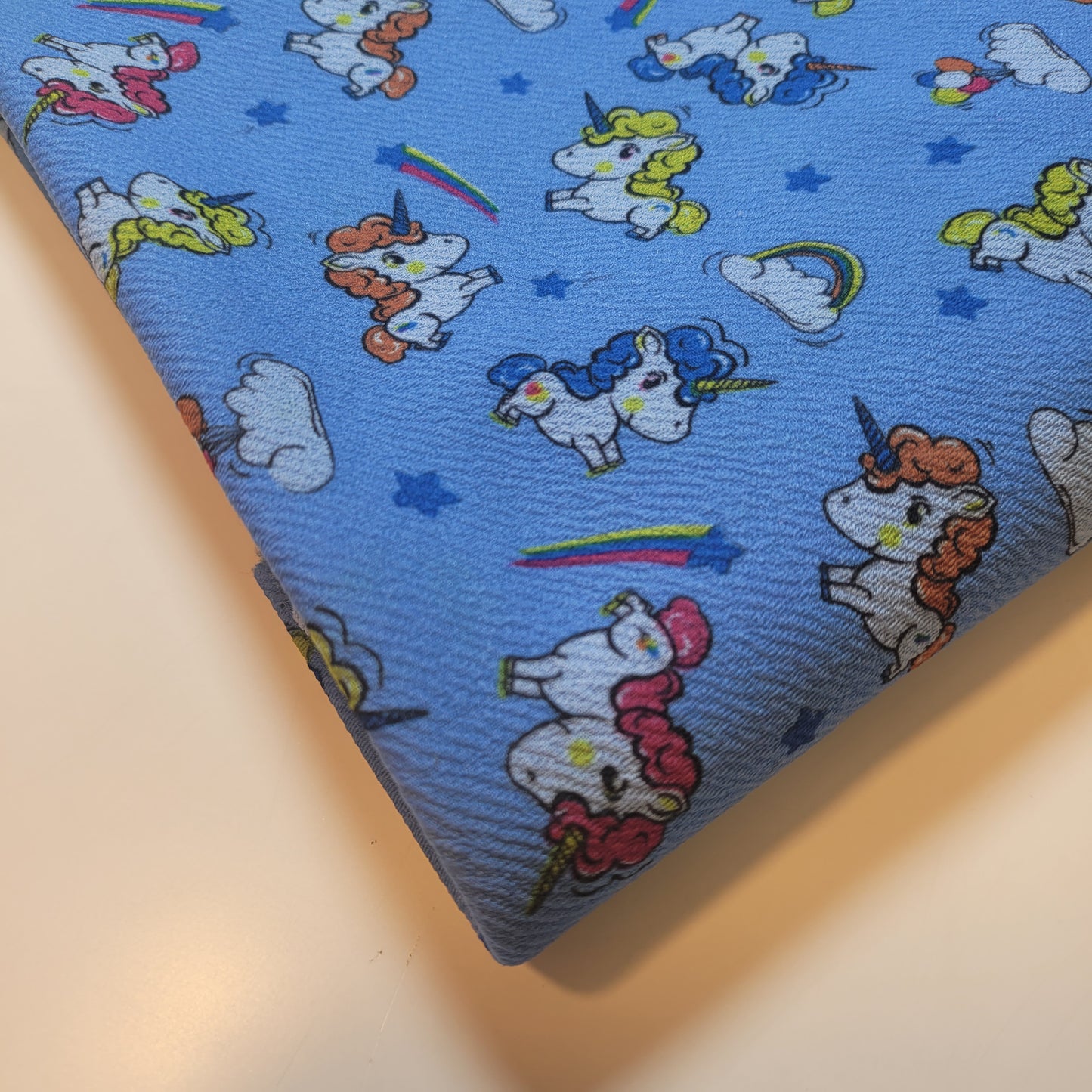 Scuba Crepe Fabric – Cute Cartoon Unicorn Print on Blue | Stretch Fabric by the Meter (58” Wide)