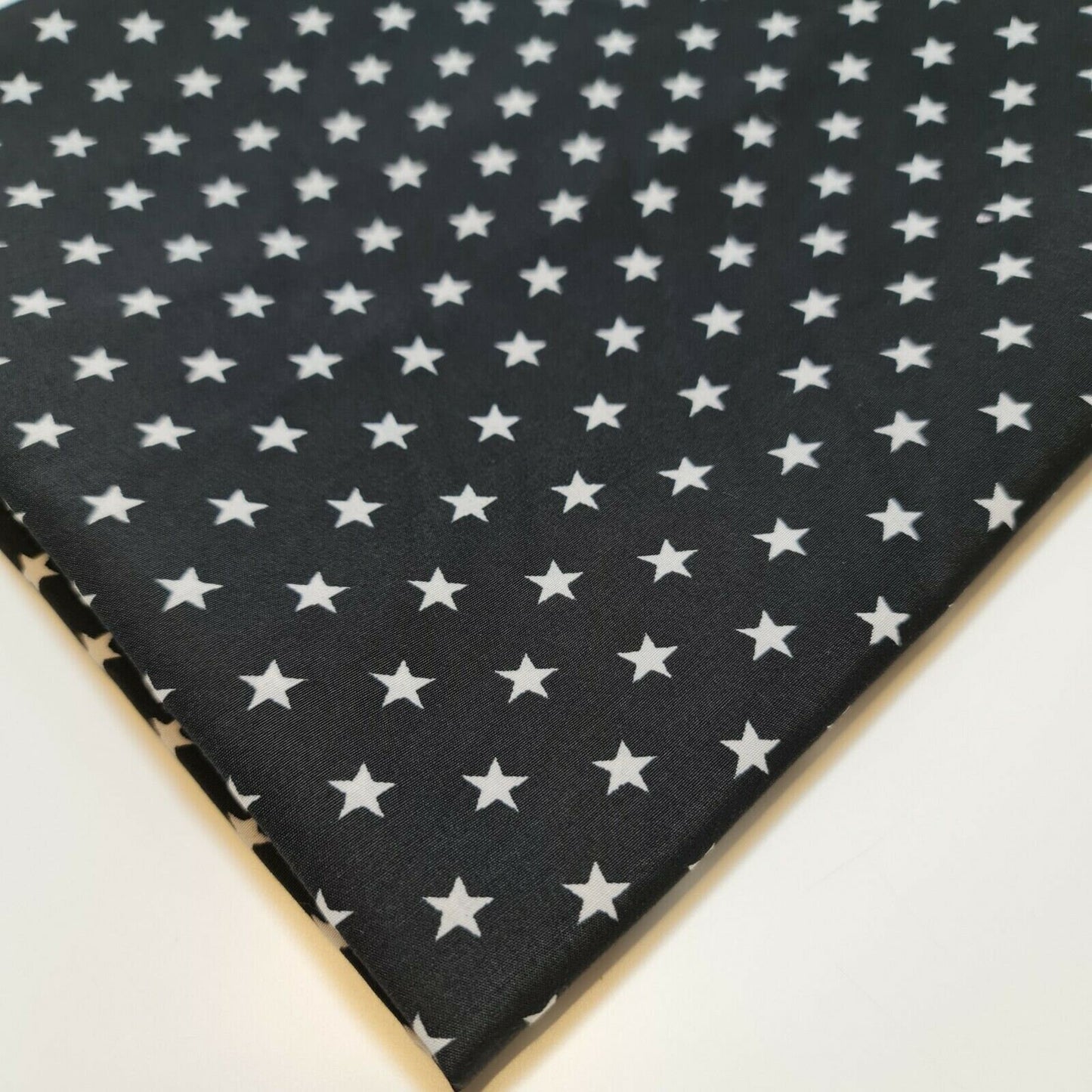 black polycotton fabric with stars print