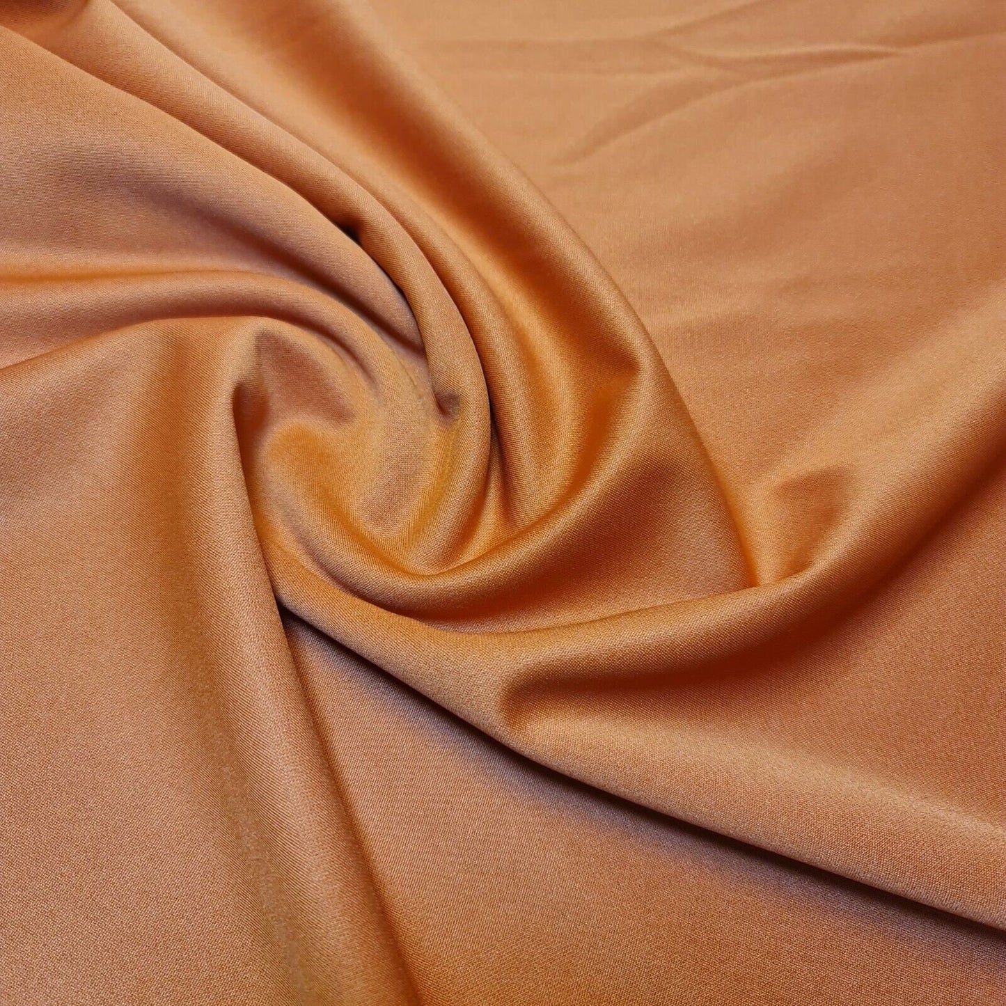 plain burnt orange scuba crepe fabric for dressmaking and craft in uk