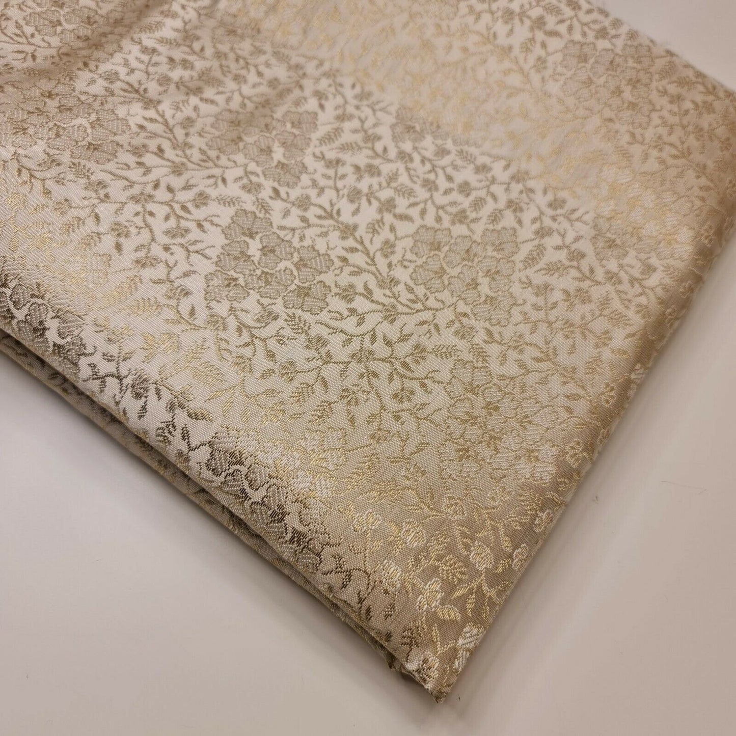 ivory brocade fabric with floral gold metallic print