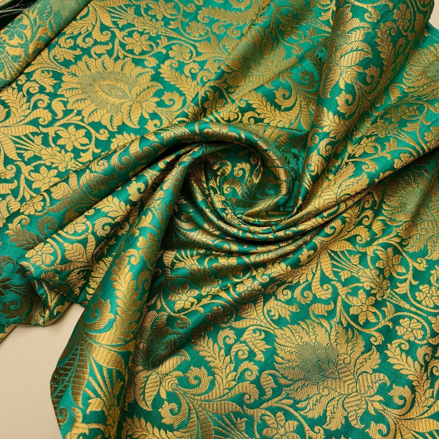 jade green brocade fabric for dressmaking and crafting
