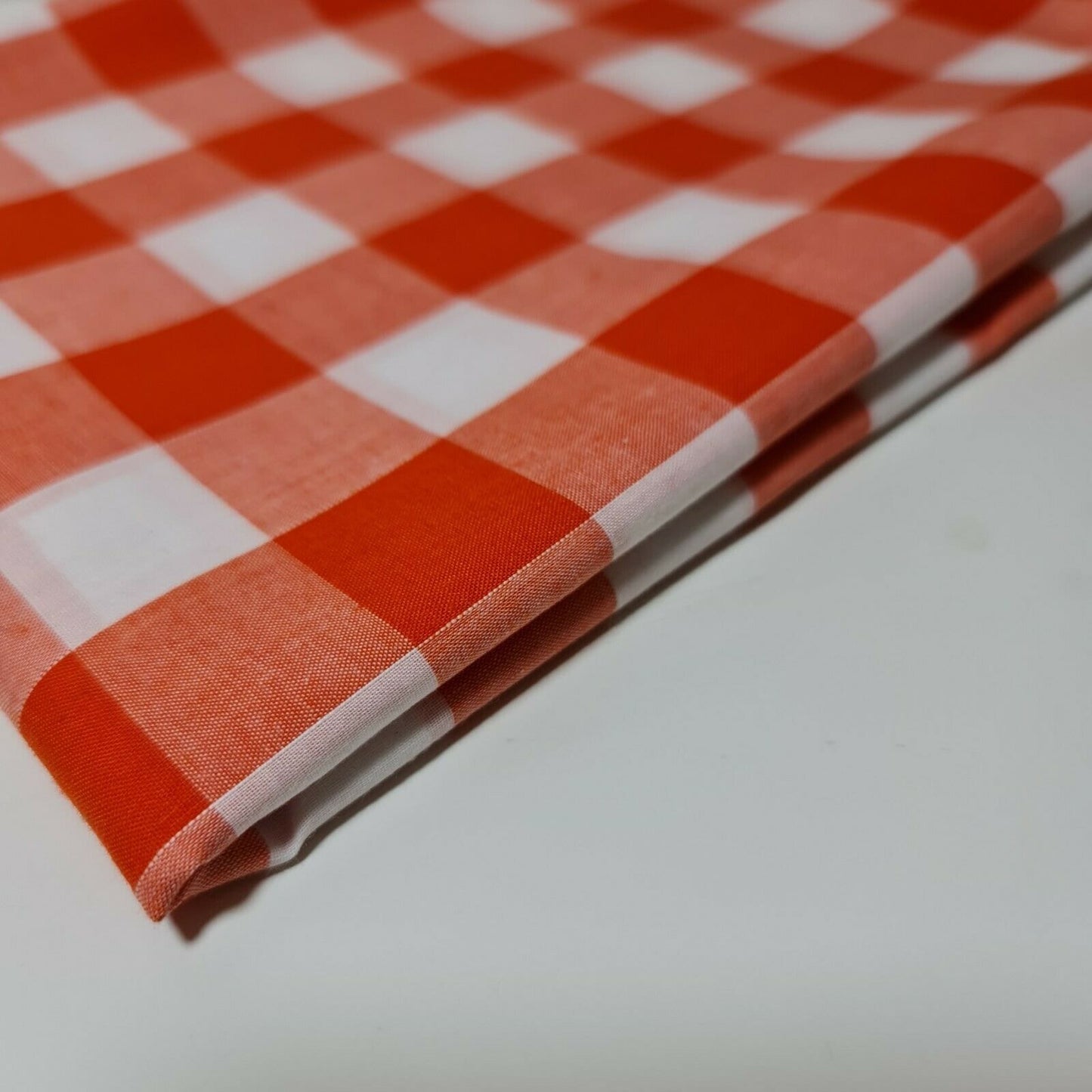 orange polycotton gingham material with check pattern