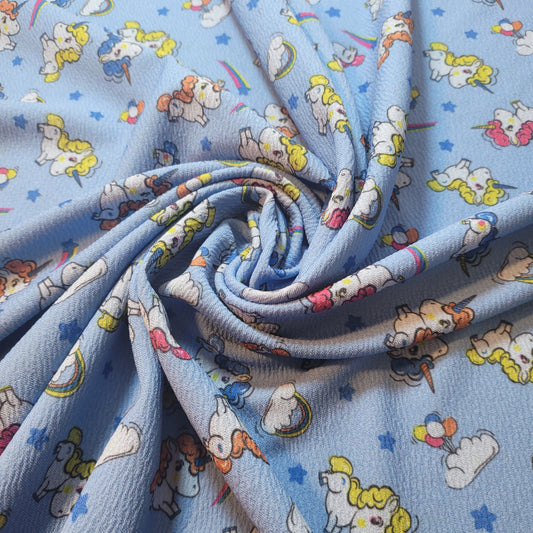 Scuba Crepe Fabric – Cute Cartoon Unicorn Print on Blue | Stretch Fabric by the Meter (58” Wide)
