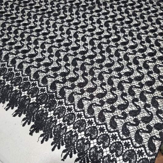 Black embroidered lace fabric with scalloped border