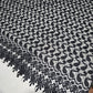 Black embroidered lace fabric with scalloped border
