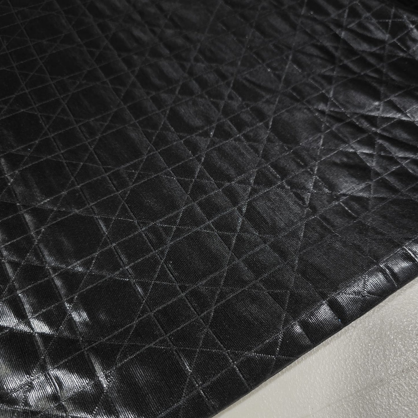 Black Leather Look Quilted Jersey Fabric by the Metre | Stretch Dressmaking Fabric