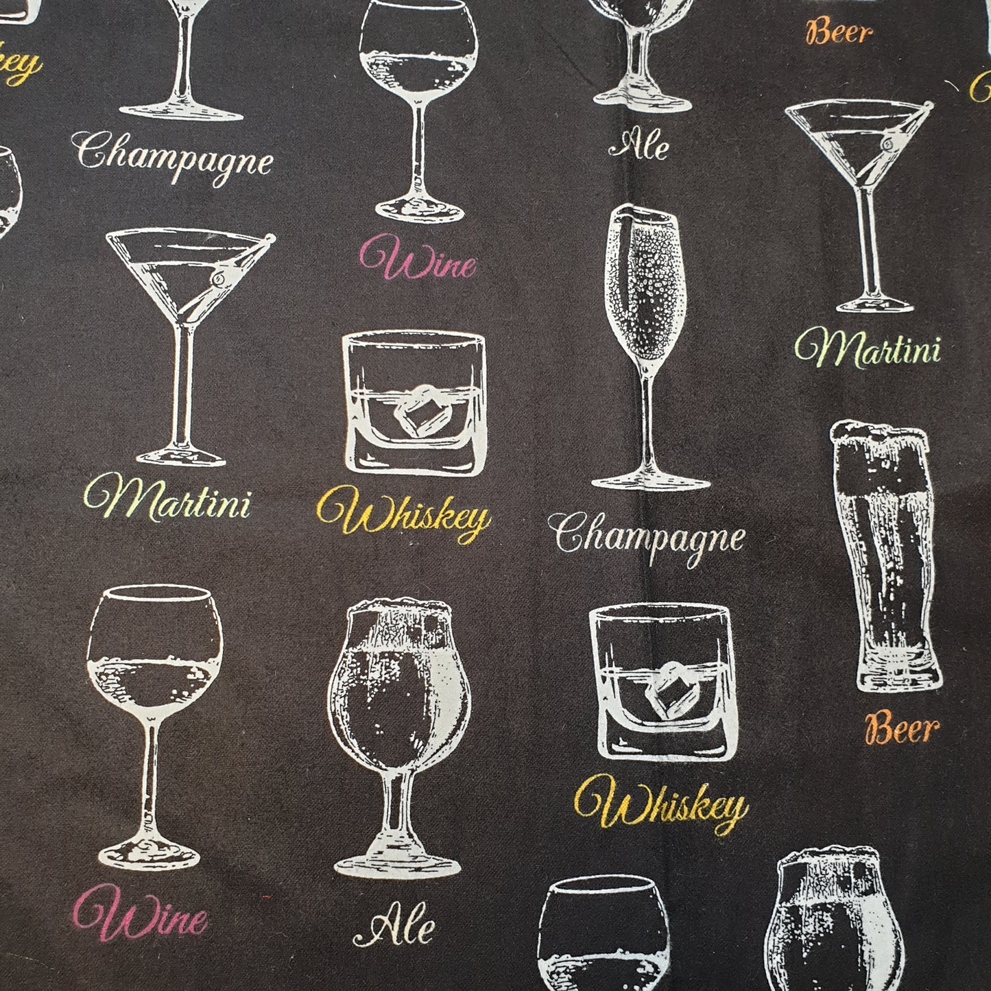 black brushed cotton winceyette fabric with bar drinks print