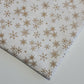 ivory xmas cotton fabric with gold snowflakes print