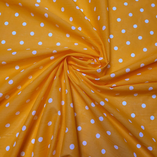 orange polka dot polucotton fabric for dressmaking and quilting