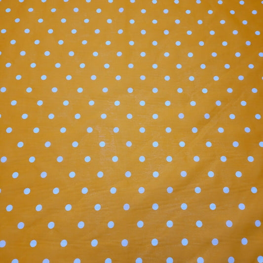 orange spotty polka dot polycotton material