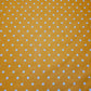orange spotty polka dot polycotton material