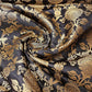 black brocade fabric with floral motifs