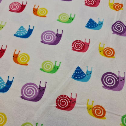 brushed cotton fabric with smiley snails print