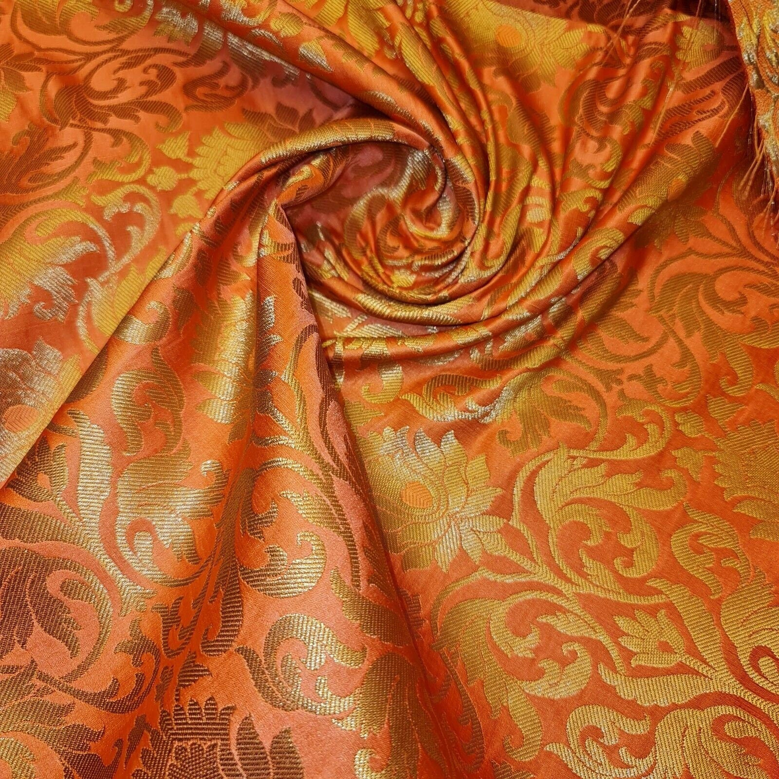 coral pink brocade fabric with tulip gold metallic pattern
