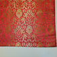 coral pink brocade textile for dressmaking and decor