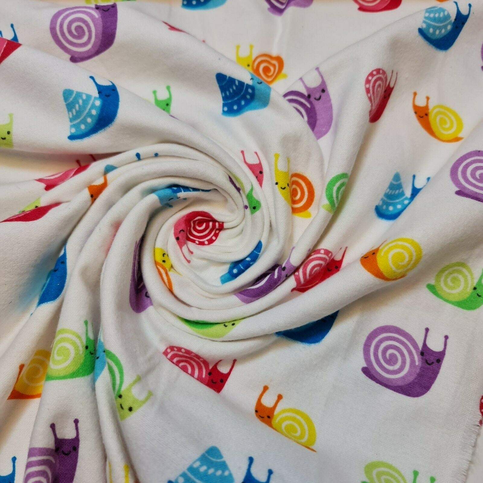 cotton flannel fabric​ with smiley snails print