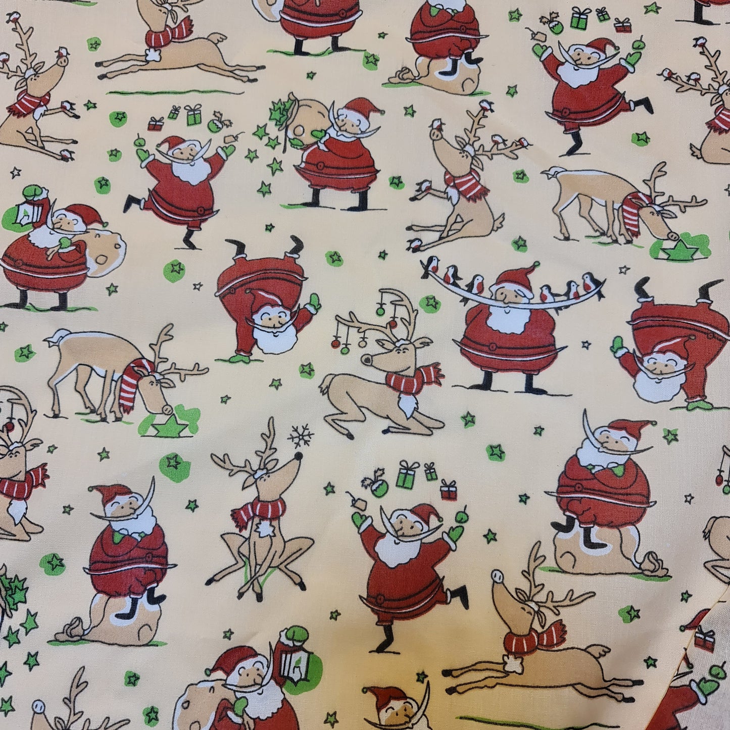 cream christmas polycotton fabric uk with santa and reindeer print