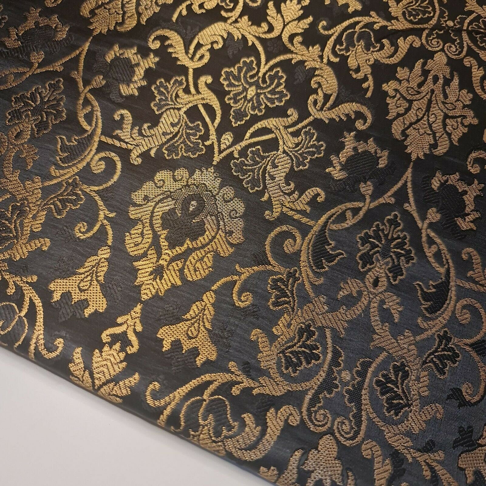 dark grey brocade material with floral print