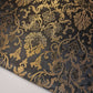 dark grey brocade material with floral print