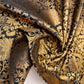 gold and black damask brocade fabric with floral gold leaf metallic design sold by meter online in uk