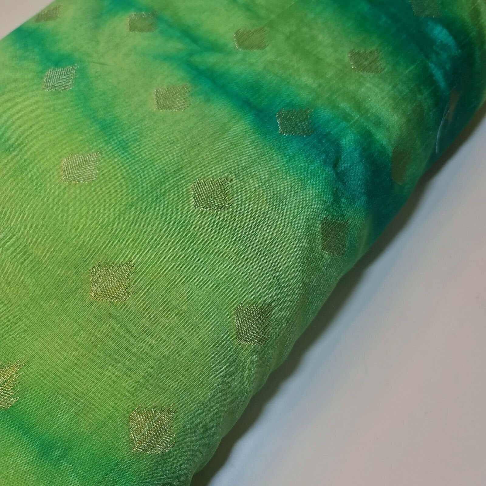 green brocade material fabric