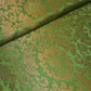 green brocade material with floral print