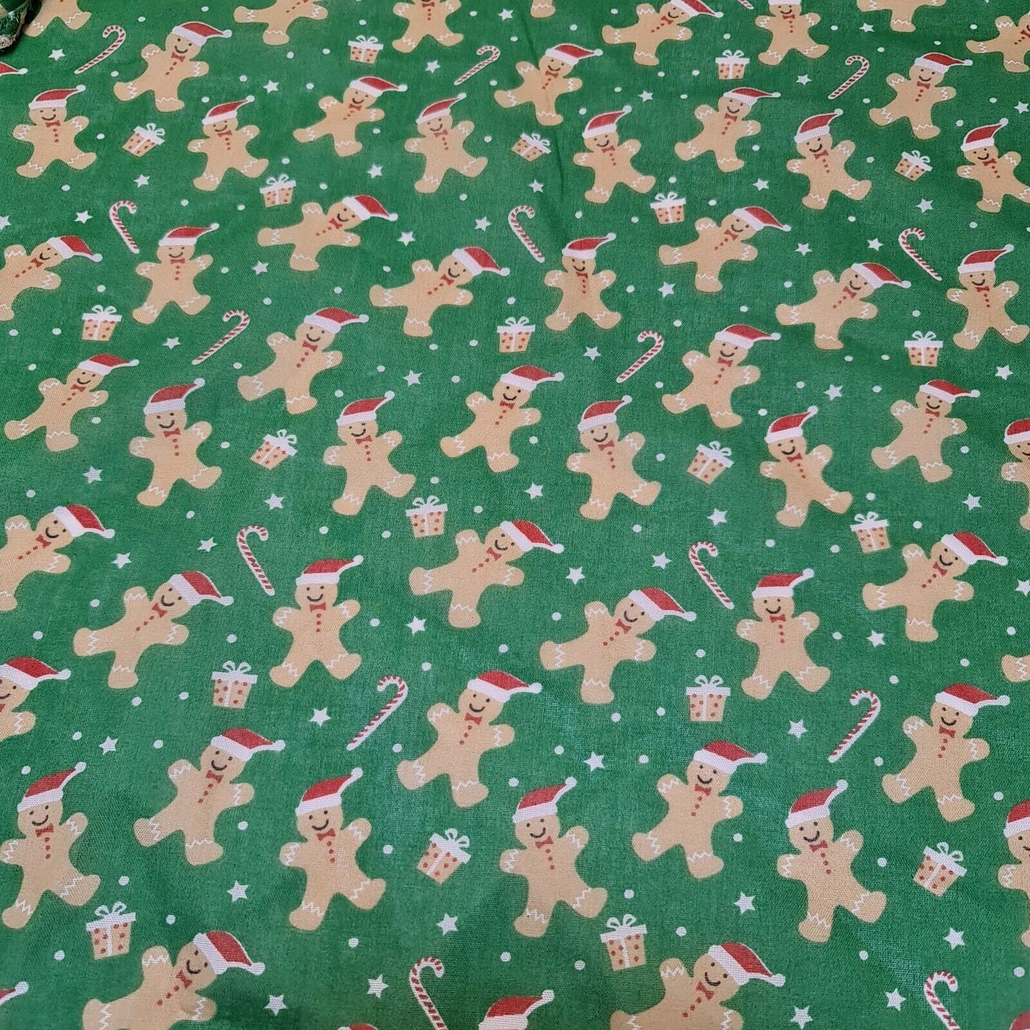 green christmas fabric with ginger man print