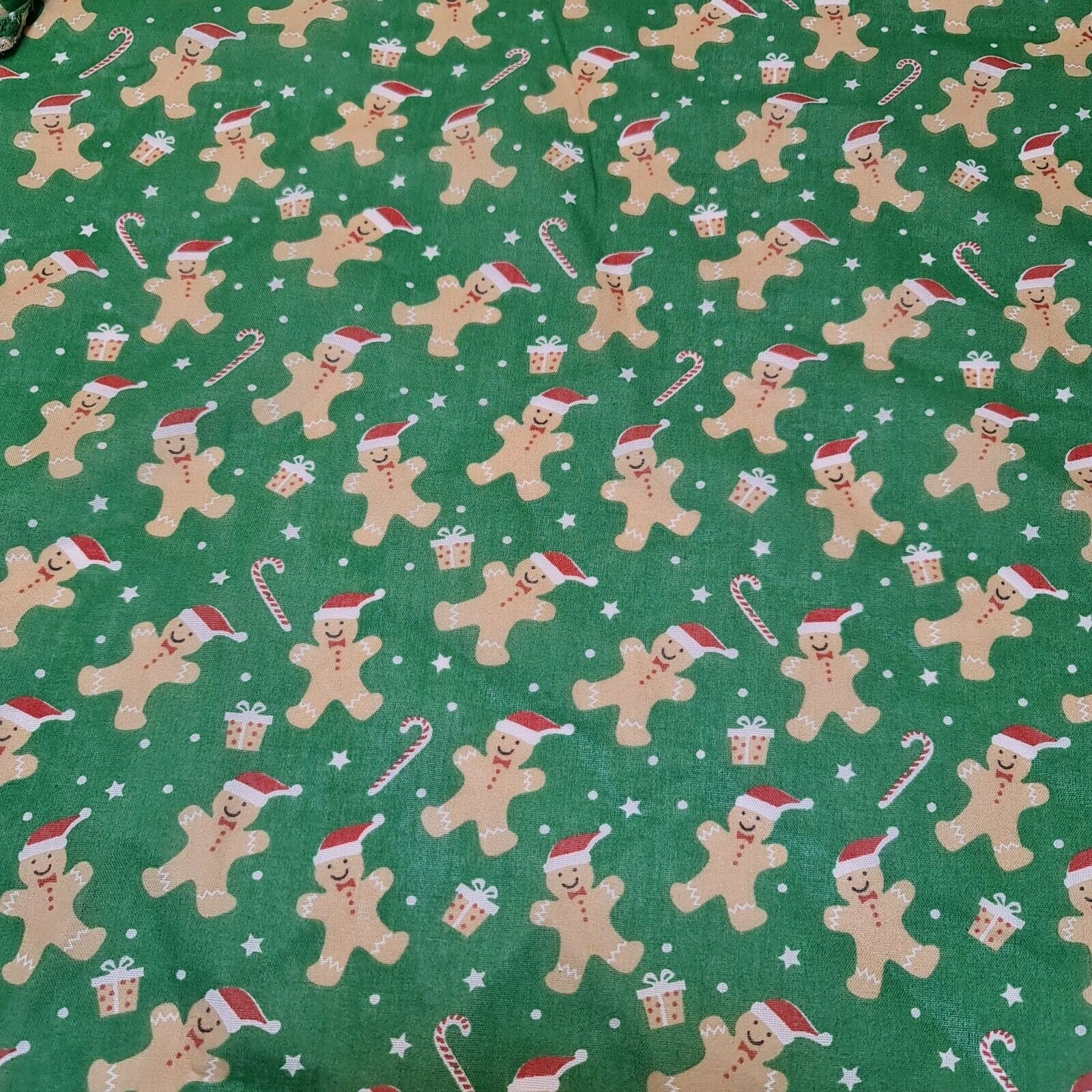 green christmas fabric with ginger man print