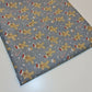 grey christmas fabric with ginger man print