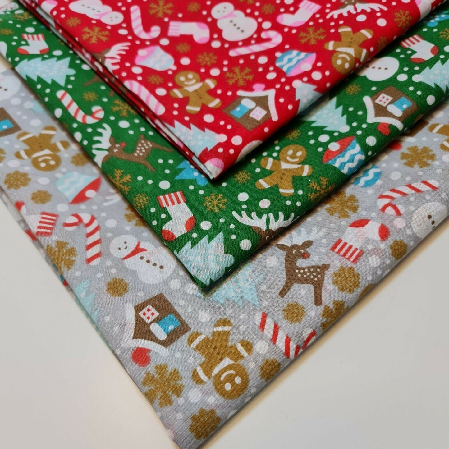 grey red and green xmas fabric by the metre with ginger mane print