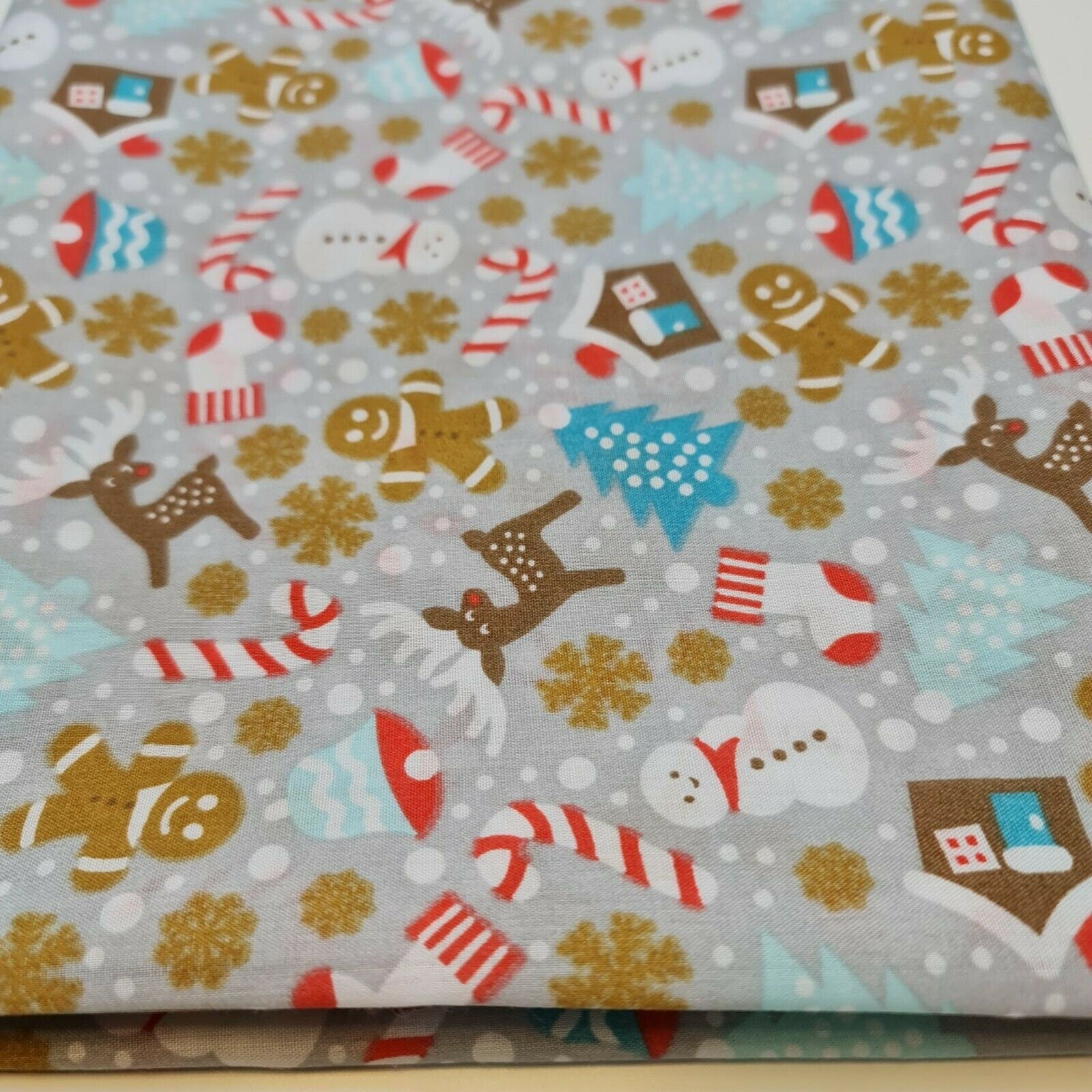 grey xmas fabric by the metre with festive ginger mane print