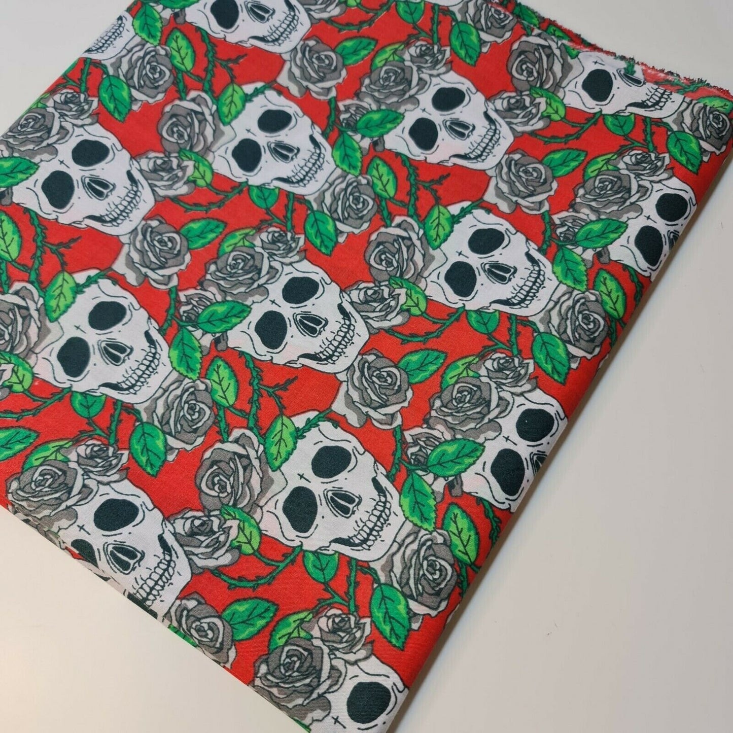 halloween material fabric with haunted skull and roses design