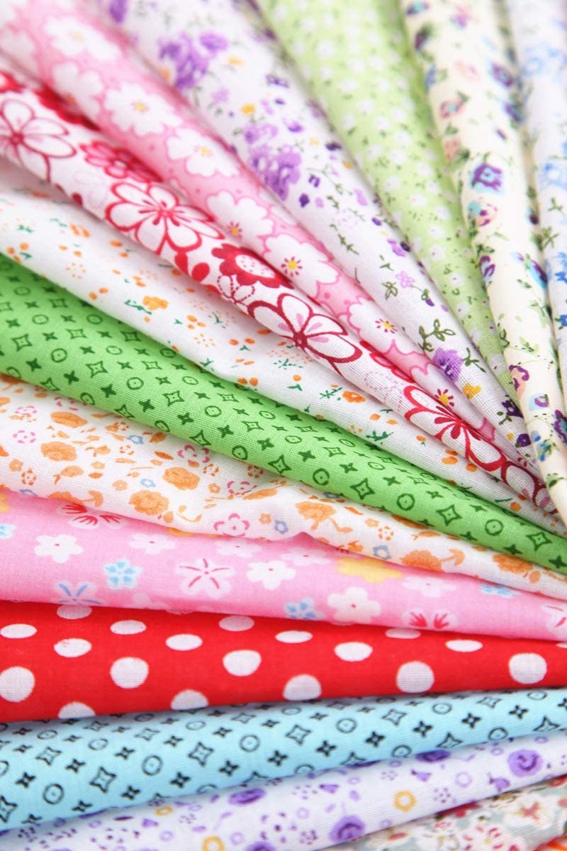 20 Piece polycotton bundle of floral's and spotty Leaves  fabrics 25 cm x 25 cm