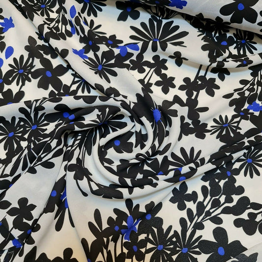 Bedruckter Kreppstoff, weißer Grund, schwarze Blumen, neonblaue Punkte, Kleid (58" breit)
