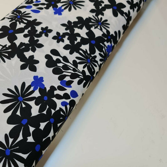 Bedruckter Kreppstoff, weißer Grund, schwarze Blumen, neonblaue Punkte, Kleid (58" breit)