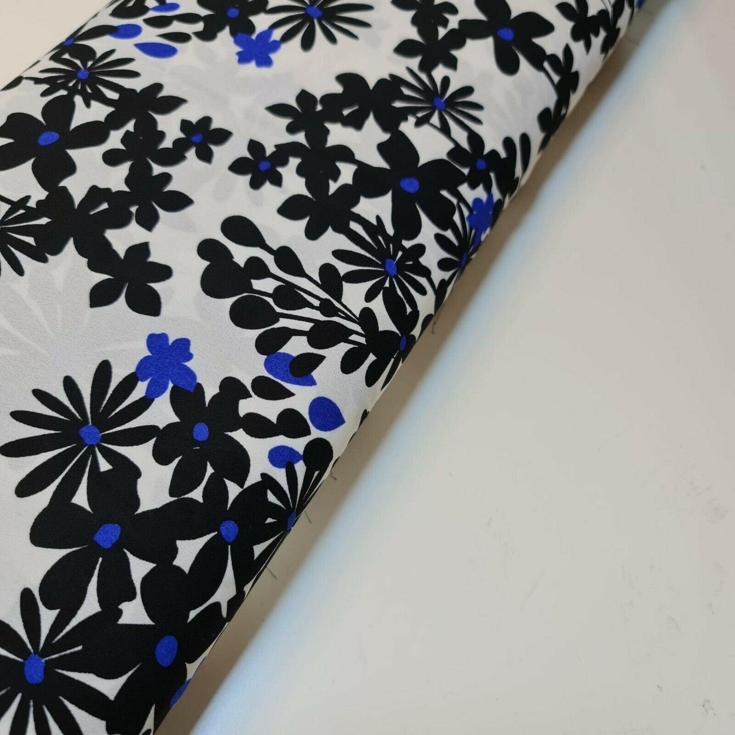 Printed Crepe Fabric White Base Black Flowers Neon Blue Spot Dress (58" wide)