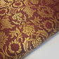 maroon brocade material with floral print