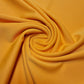 plain mustard scuba crepe fabric sold by i need fabric brand in uk