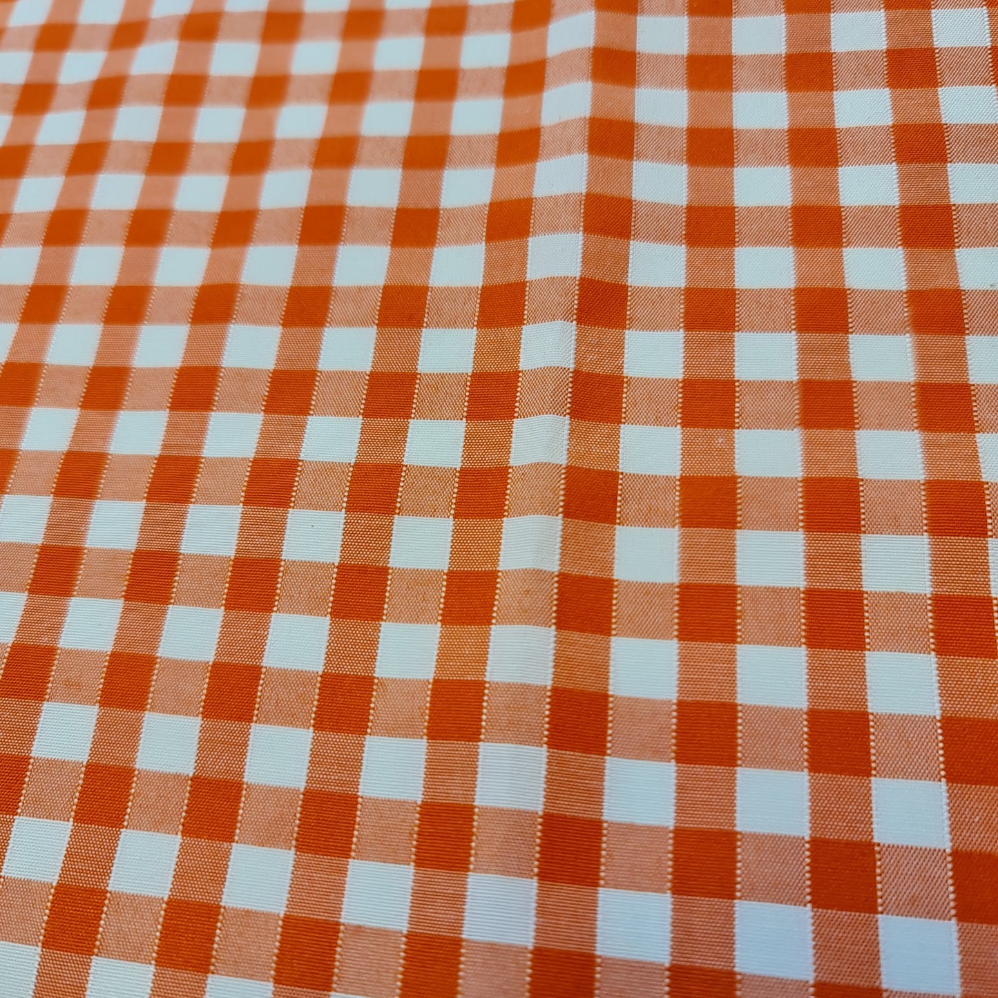 orange polycotton gingham material with check pattern for dressmaking
