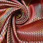 red brocade fabric with metallic gold leaf print
