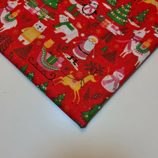 red christmas fabric by the metre with christmas themed print