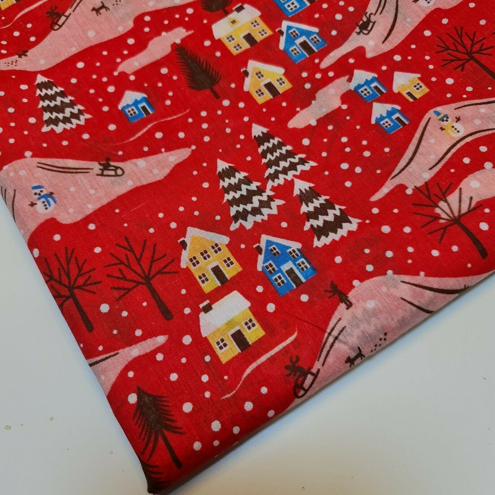 red christmas material with christmas festive print