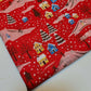 red christmas material with christmas festive print