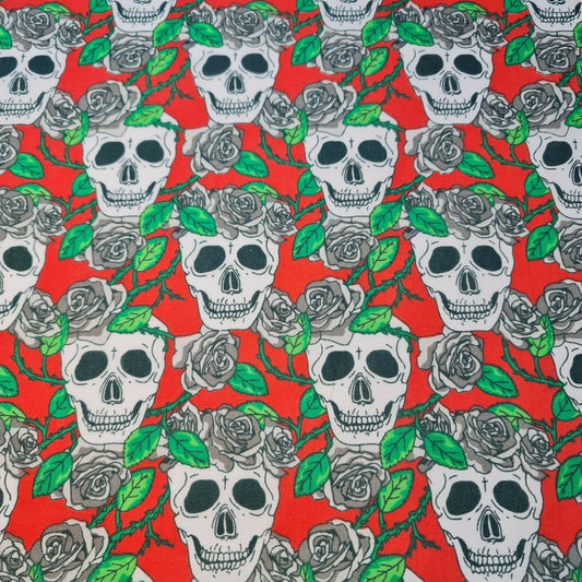 red polycotton fabric with skulls and roses print