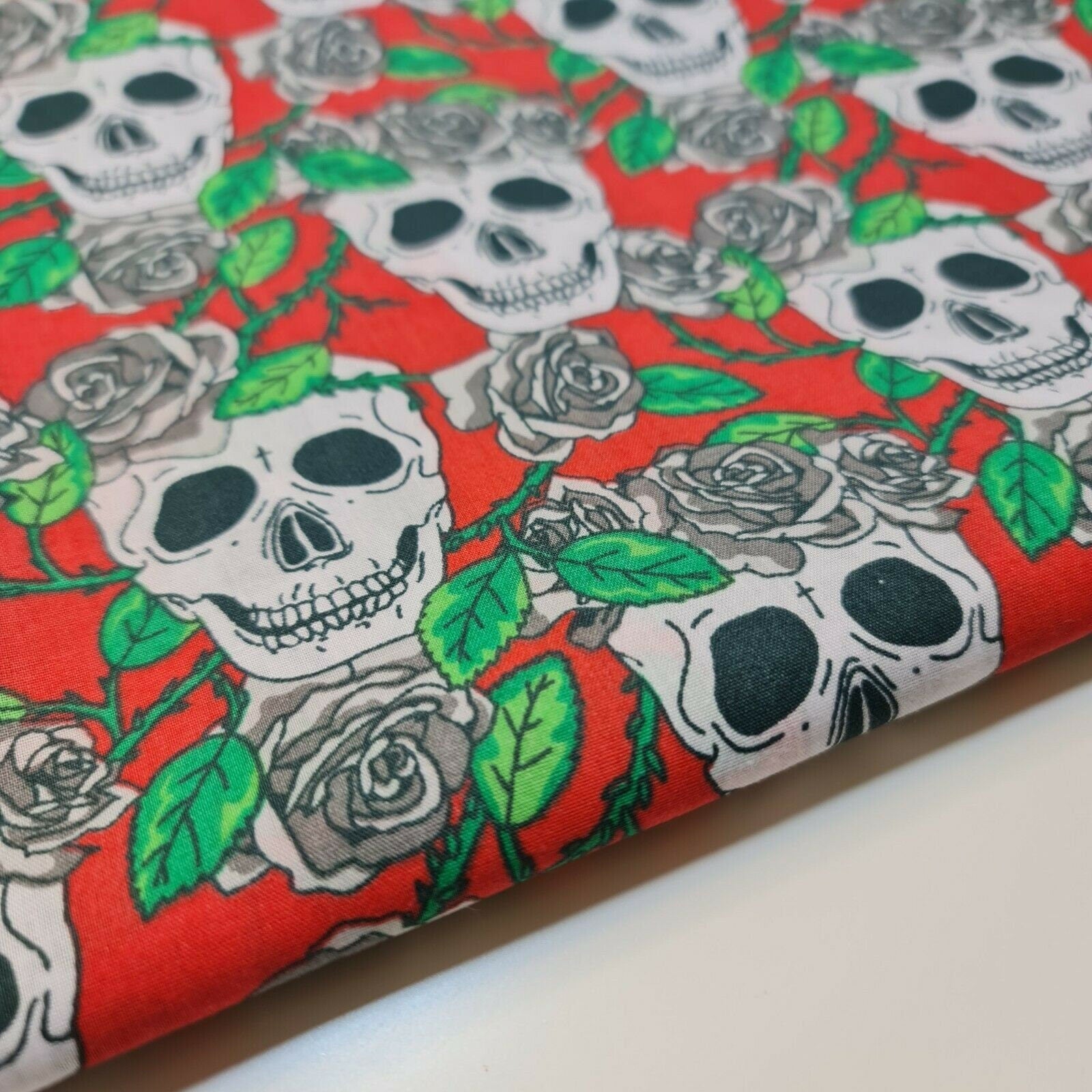 spooky skulls and roses halloween polycotton fabric