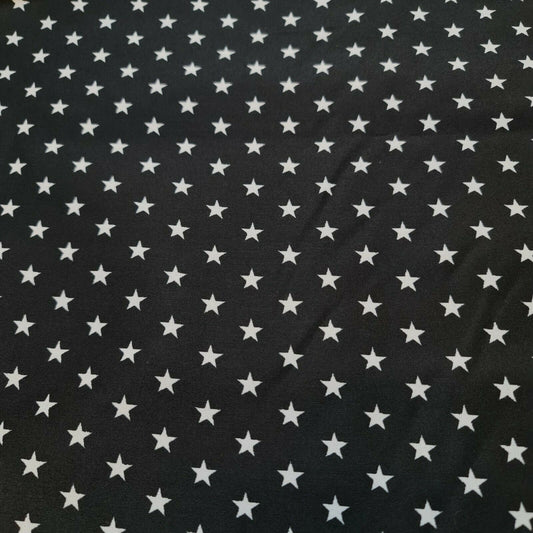 stars print black polycotton fabric