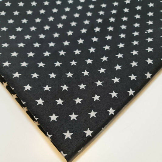 white stars printed black polycotton fabric uk
